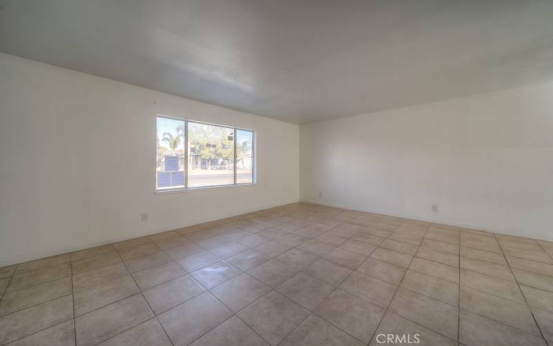 LIVING ROOM WITH TILE FLOORING