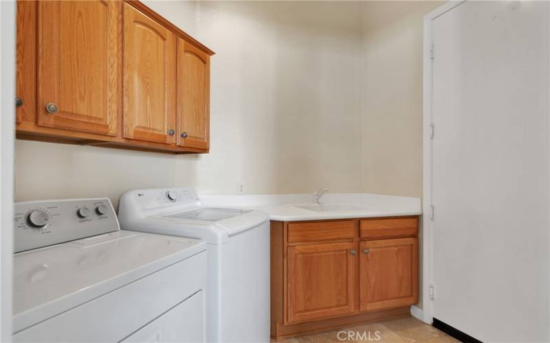 Inside laundry room with washing machine & dryer included