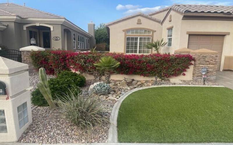 Front of house with mailbox and grass