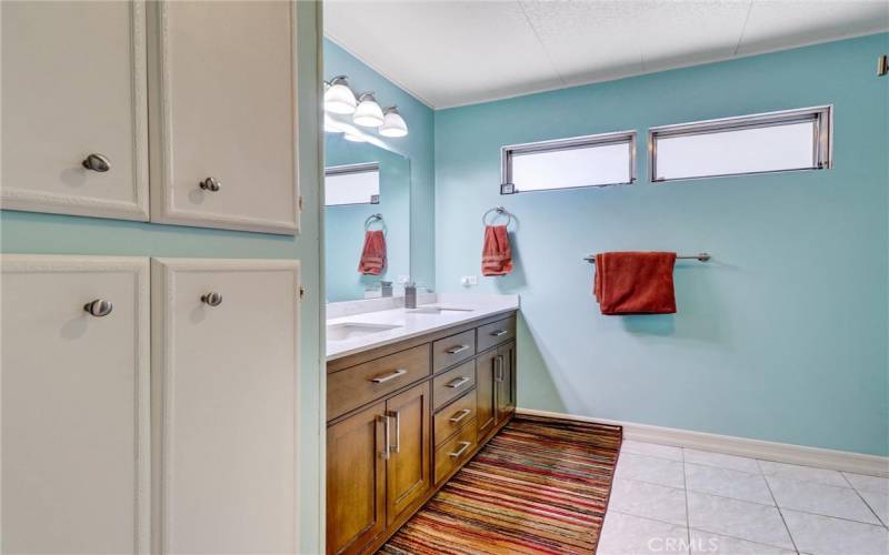 Dual Vanities And Quartz Counters In Main Bathroom