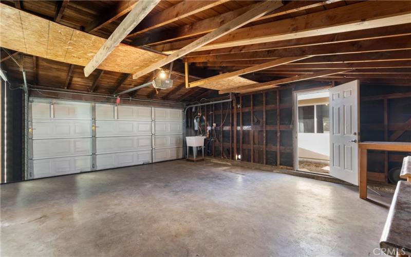 Garage door opener and laundry hook-ups.