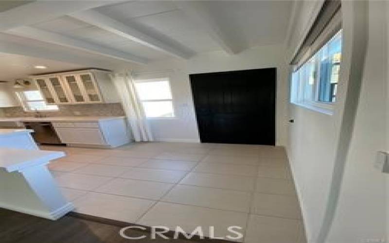 Kitchen area looks out into living space