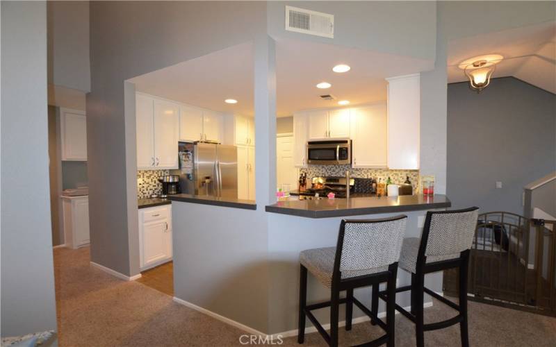 Breakfast bar with barstools included.  Kitchen is open to the great room.