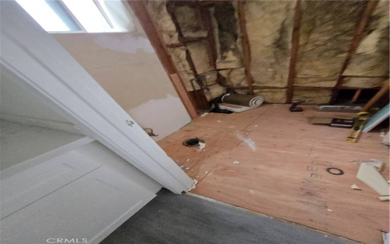 hall bathroom. Tub/shower and toilet being installed.