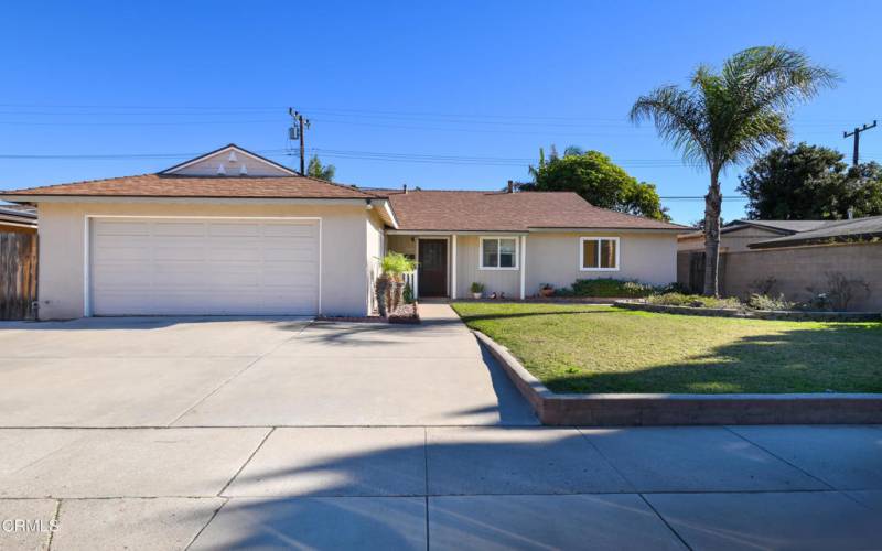 Front with 3 car driveway