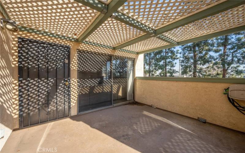 Large patio accessible from the living room or kitchen, No one above or below you. The property sits above garages