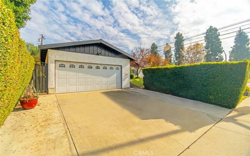 Garage and paved driveway