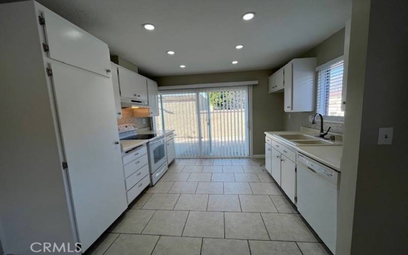 Kitchen leads to private patio