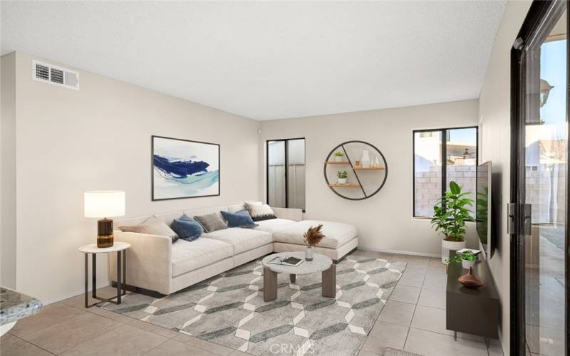 Family room opens up to kitchen Virtually Staged