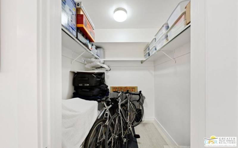 The second bedroom has a walk-in closet large enough to store bikes.