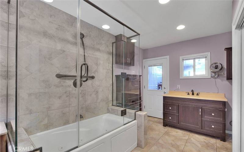 Tiled shower with frameless doors