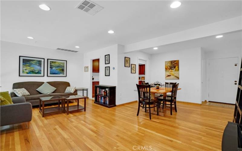 Dining and living rooms off remodeled kitchen.