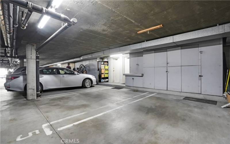 2 car side by side parking with storage lockers.