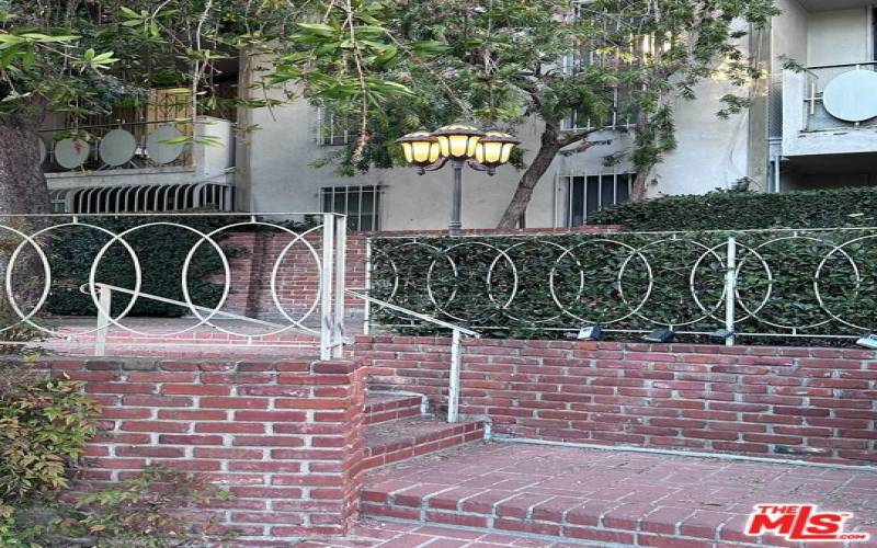 FRONT ENTRANCE STAIRS TO CONDO BUILDING