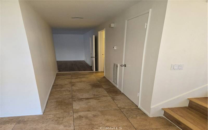 Downstairs hallway and stair to the right headed to Family Room
