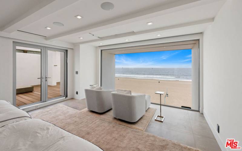 Primary Bedroom With Beach Front Views