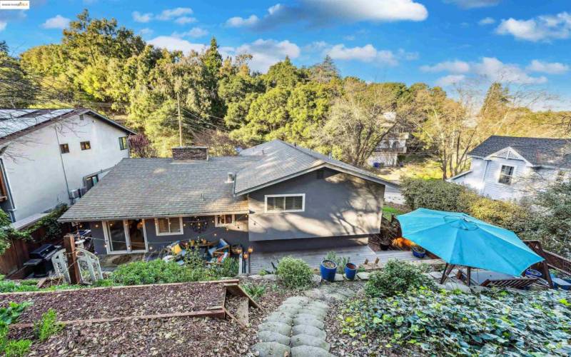 Backyard surrounded by nature's serenity.