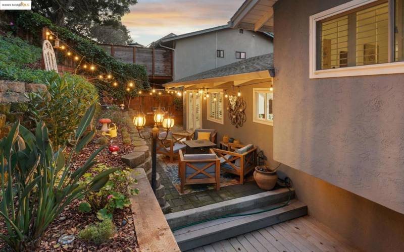 Charming backyard with a cozy patio.