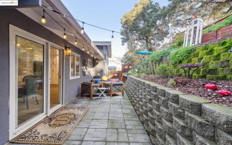 Charming backyard with a cozy patio.