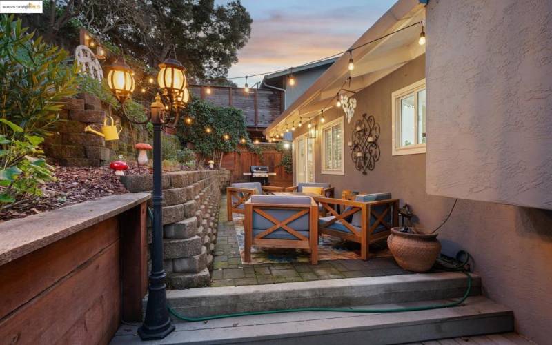 Charming backyard with a cozy patio.