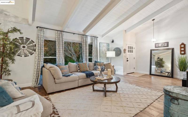 Bright and airy living room with vaulted ceilings.