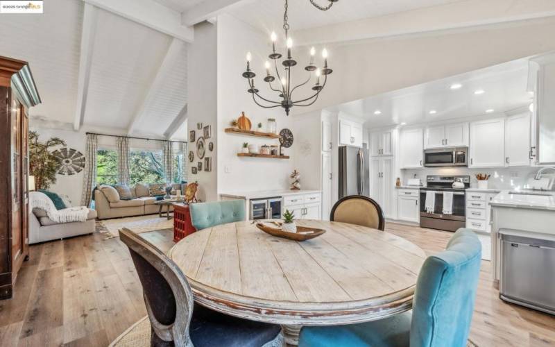 Bright dining area with chandelier.