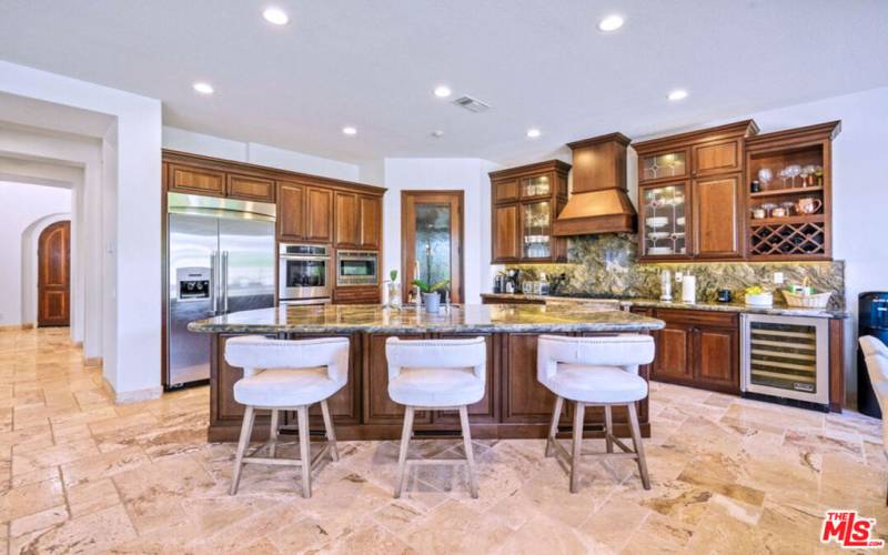 Large kitchen with top appliances