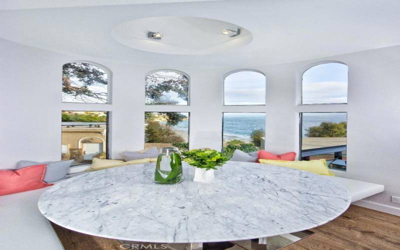 GORGEOUS CARRERA MARBLE DINING ROOM TABLE over-looking world famous Thousand Steps Beach.