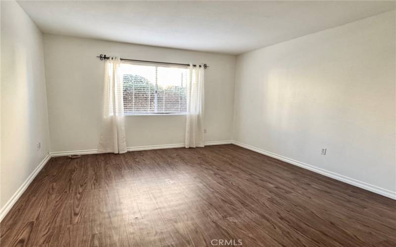 bedroom with laminate floors