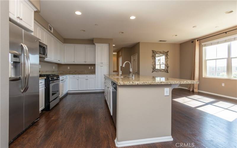 Stainless steel appliances in kitchen.