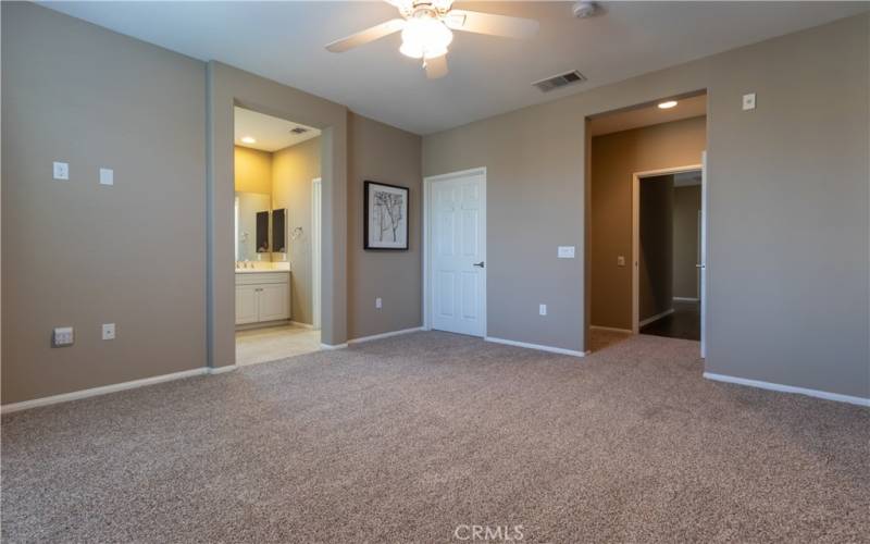 Ceiling fan and ensuite bath.