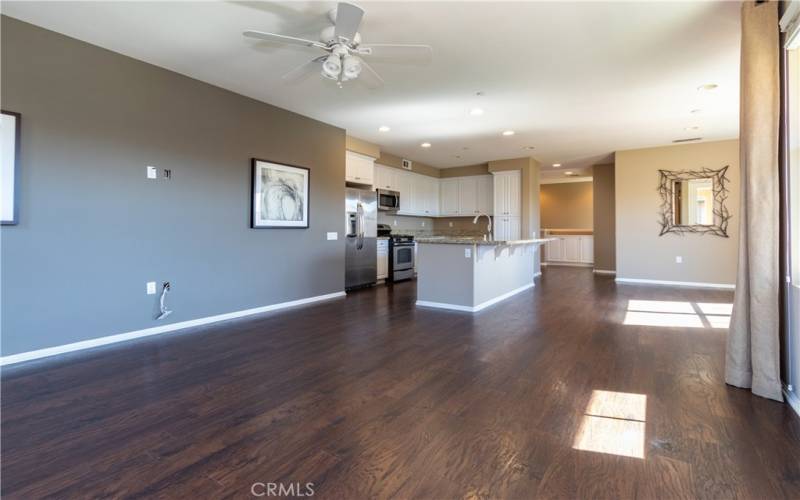 Wood style floor and neutral palette.