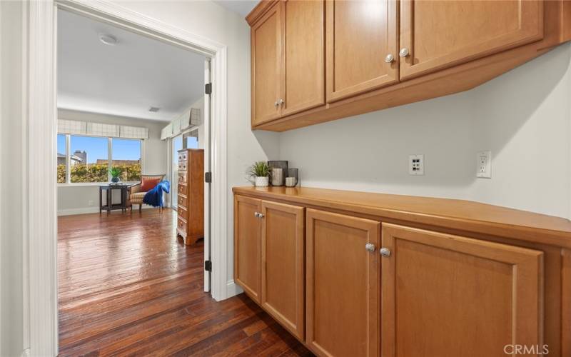 Beautiful cabinet storage in hallway for linens, bath towels, candles, etc.