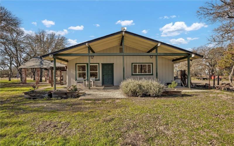 Back of house from Oak tree grove