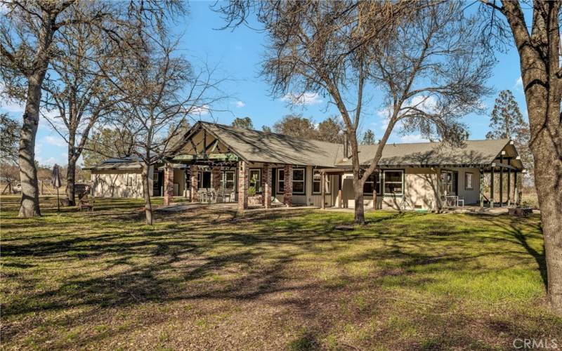 Back of house from Oak tree grove