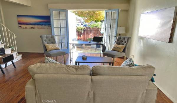 OPEN the French Doors and Enjoy One of TWO Patios