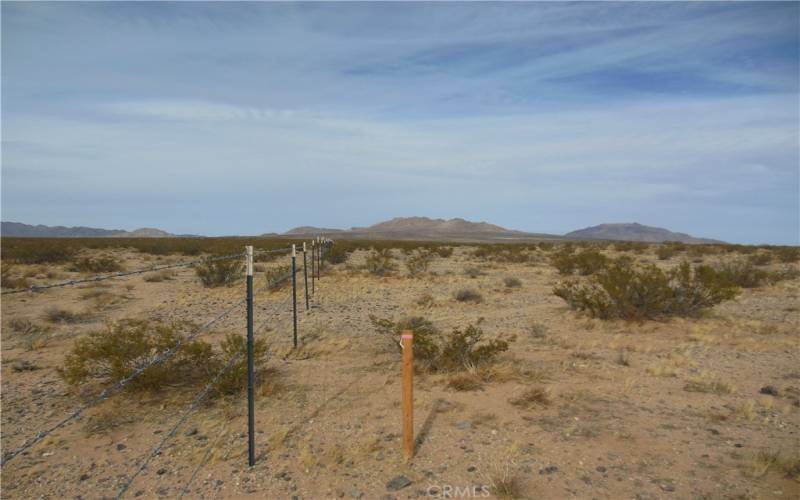 BLM Fence line on west side of property. Marker is in easement to parcel.