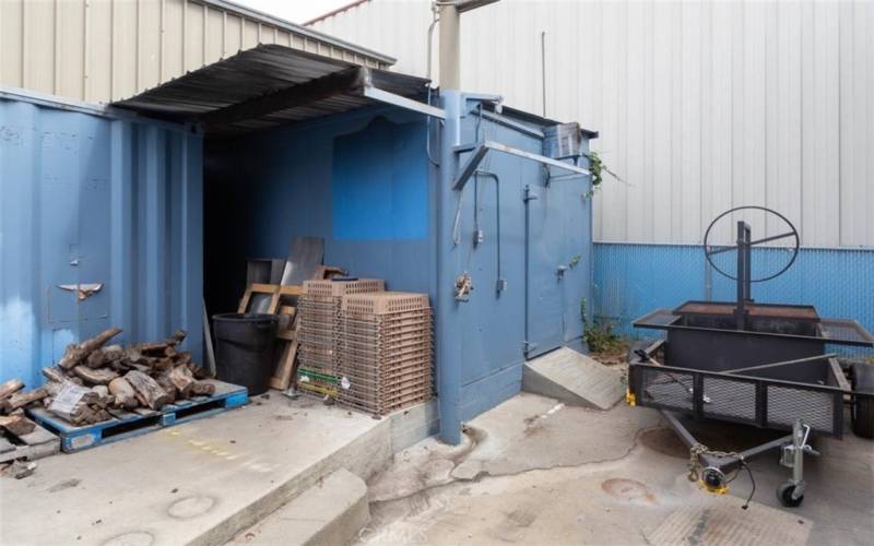 Outside area with a freezer- it was once used as a large game freezer.