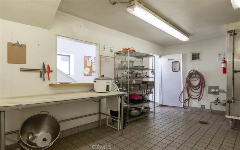 Entrance to the kitchen from the front door. The built- in Smoker is seen on the right.