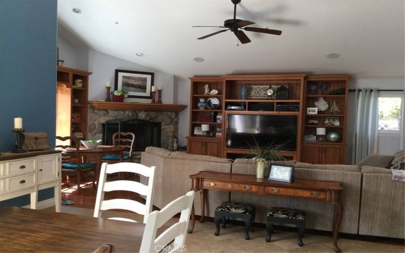 Dining area and family room off of kitchen with French doors to backyard.